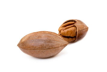 Fresh pecan nuts isolated on a white background