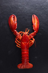 Lobster boiled on black mable.