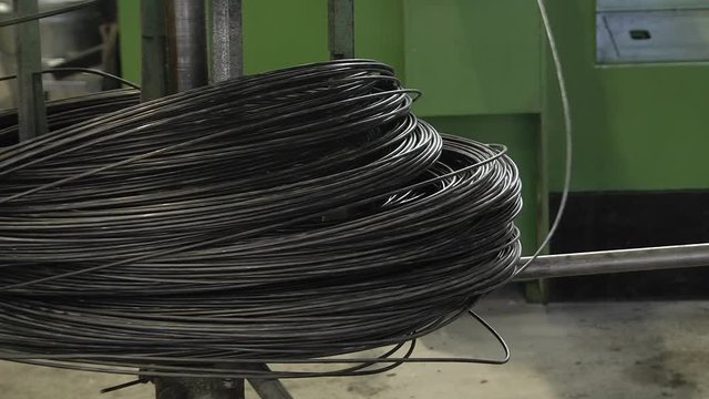Wire in coils; merchant's quality wire, tie wire, rebar wire. Low carbon steel wire general purpose.   bull rod, coil rod, rolled wire production. Manufacturing Wire Steel Works.