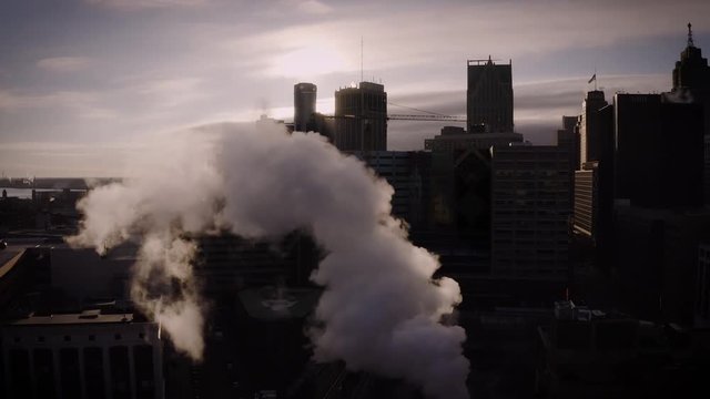 Steamy downtown city skyline in morning light