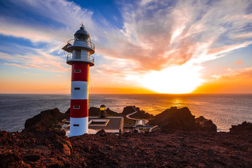 The beautiful lighthouse at a sunset in Punta de Teno, Tenerife (Canary Islands)
