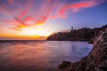 The lighthouse at a sunset of Punta de Teno seen from afar, Tenerife (Canary Islands)