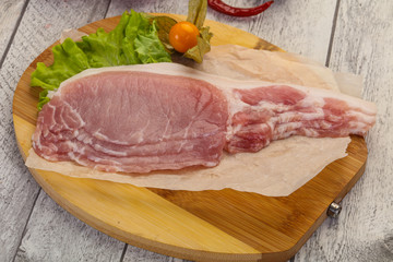 Raw pork bacon