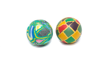 two small colorful Bouncing ball jumping,, isolated on white background - toy relax concept