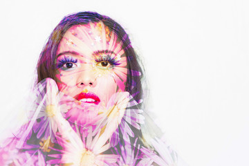 Naklejka premium Beauty portrait of young Asian woman and purple marguerite daisy flower double exposure