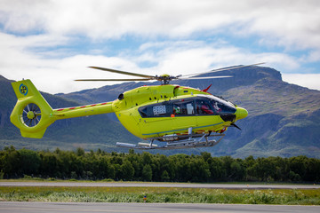 Helicopter in flight Br&oslash;nn&oslash;ysund air port, Northern Norway