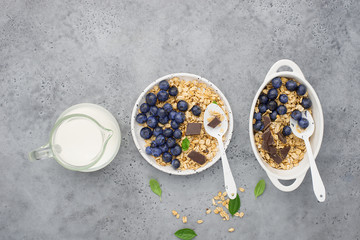 Healthy balanced breakfast. Whole grain caramel granola, fresh organic blueberries. Minimalism.