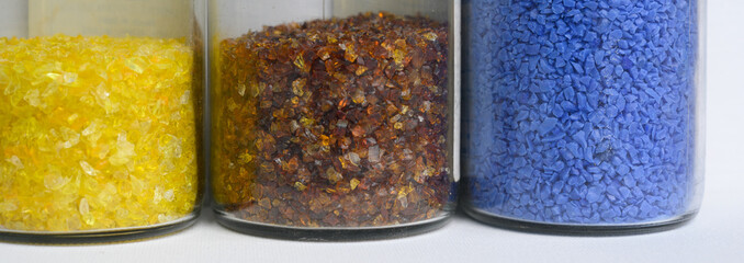 Jars of pulled cane and frit glass blowing supplies