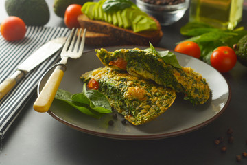 Omelet with spinach leaves. Healthy omelette for lose weight. Healthy food.