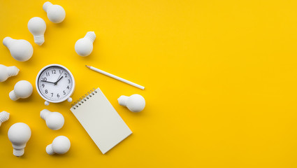 Ideas inspiration concepts with group of lightbulb and business equipment on on pastel color background.creativity for sucess.