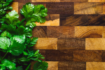 Loose Bunch of Cilantro on Butcher Block