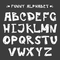 Funny white cut alphabet for your banners or invitations. Set of handdrawn letters made in vector isolated on black background. Abc - perfect illustration for your design - print, poster, card, logo