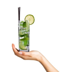 Woman hand holding cocktail in tall glass on white background