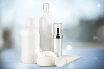 Cosmetic containers isolated on background