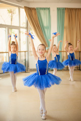 Little ballerinas in ballet studio