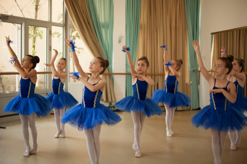 Little ballerinas in ballet studio
