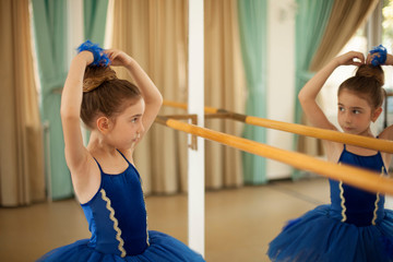 Little ballerinas in ballet studio