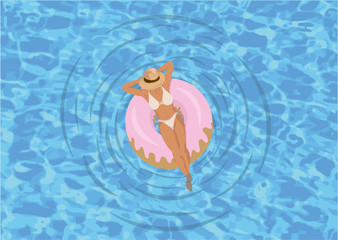 Mujer tumbada en flotador de donuts dentro de una piscina