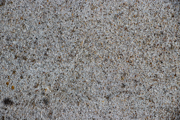 white painted stucco pebble wall