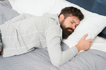 Sleep wake homeostasis keeps track of your need for sleep. Man sleep at home. During deep sleep...