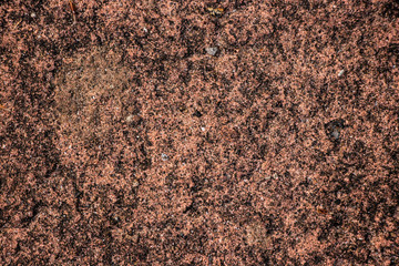 Rust coloured ground texture shot