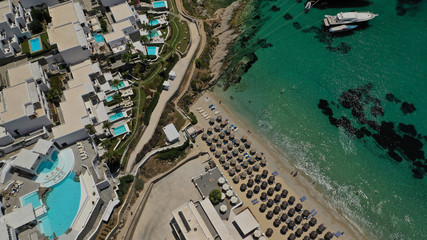 Aerial panoramic photo of famous turquoise clear sea celebrity sandy beach and bay of Psarou with...