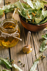 Fototapeta na wymiar Linden honey, dry flowers, alternative medicine
