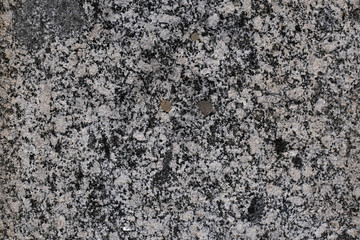 Old granite stone wall. ancient wall. masonry texture, stonework pattern background