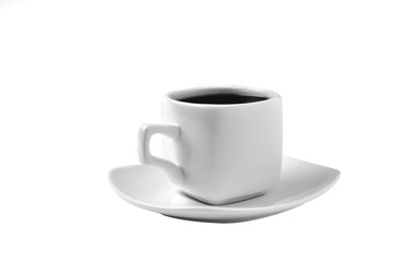 white cup of coffee on a white saucer; on a white background