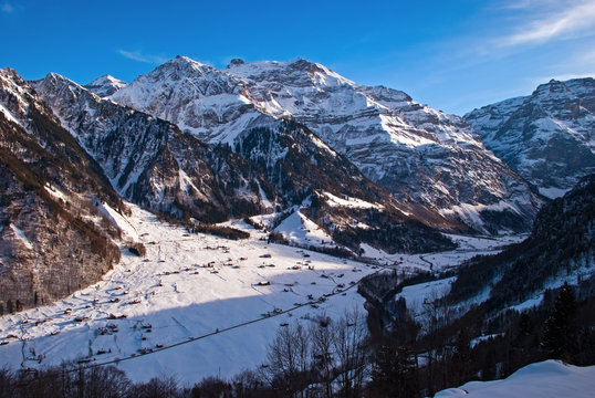 Snow covered Klausen Pass in canton Glarus in the winter in Switzerland.
