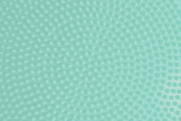 Color of year 2020 neo mint, round dotted pattern texture background.