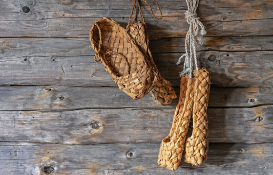 Old bast shoes. Lapti from birch bark. Vintage Russian national shoes.