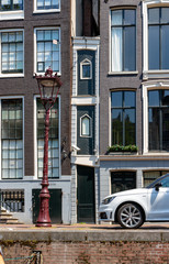 Obraz na płótnie Canvas Typical Amsterdam narrow houses