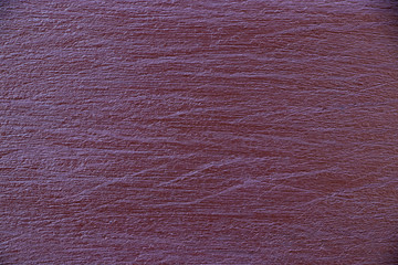 Fototapeta premium Purple concrete wall cracked texture