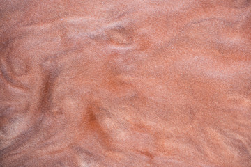 abstract background, shiny metallic paint with waves on surface with shiny sparkling