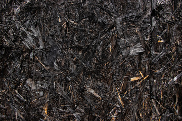 Black painted wood chip texture