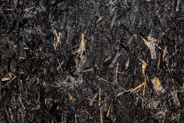Black painted wood chip texture