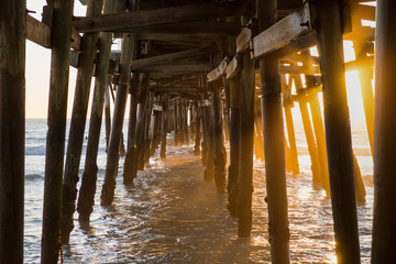 Sunset under San Clemente Pier in California. It was built in 1928 with a length of about 395 meters.