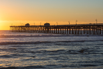 Sunset San Clemente Pier in California. It was built in 1928 with a length of about 395 meters.