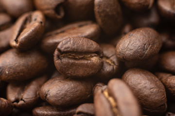 Coffee beans. Heap of dark color of raw coffee beans texture for background