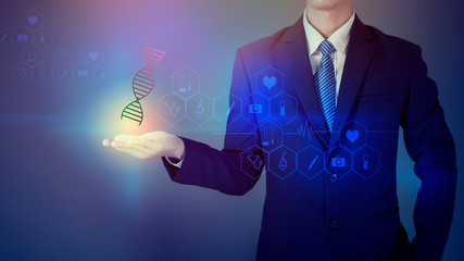 Close up Business man is holding DNA , Medical concept.