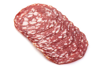 Sliced Dried sausage or salami, smoked meat, close-up, isolated on white background