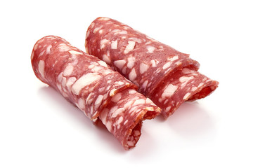 Sliced Dried sausage or salami, smoked meat, close-up, isolated on white background