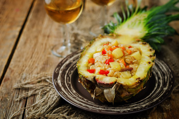 Bacon chicken pine apple vegetables fried rice in pineapples