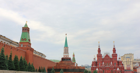 Moscow Red square with Kremlin building, Lenin mausoleum and State History museum architecture on cloudy day 