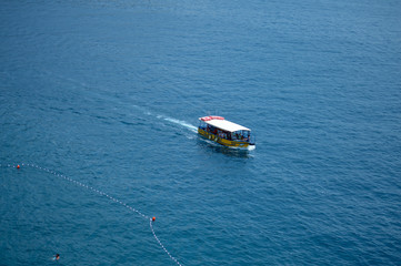 DUBROVNIK, CROATIA - JUNE 18: Boat with tourists near town Dubrovnik, Croatia on June 18, 2019.