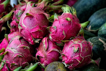 Dragon fruit, also known as Pitaya, at market stall in Ho Chi Minh City in Vietnam.