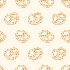 Pretzels on a beige background. Seamless pattern for printing on fabrics, paper. Vector.