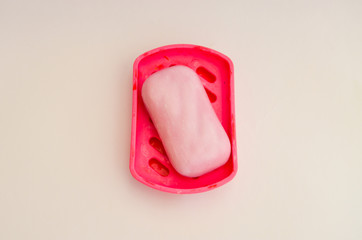 Bath accessories, toothbrush, razor, soap and soap dish, washcloth on a white background