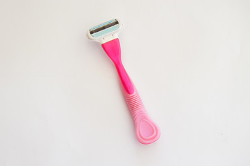 Bath accessories, toothbrush, razor, soap and soap dish, washcloth on a white background